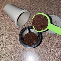 Fill up your k cup universal reusable holder with fresh ground coffee beans